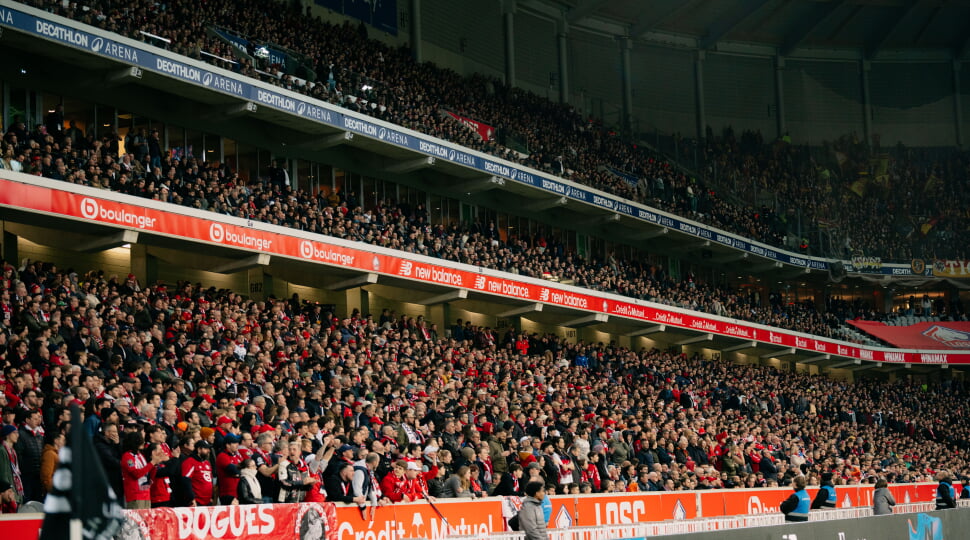 The crowd cheers LOSC Lille at Stade Pierre-Mauroy